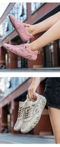 Detail view of breathable mesh and suede upper texture on outdoor sneakers