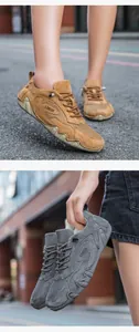 Close-up of khaki and gray outdoor sneakers featuring breathable mesh and grip soles