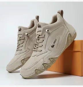 Detail of high-top suede boots featuring DBECI branding and durable anti-slip rubber sole