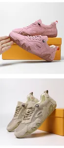 Detailed close-up of breathable mesh fabric and anti-slip rubber soles on hiking shoes