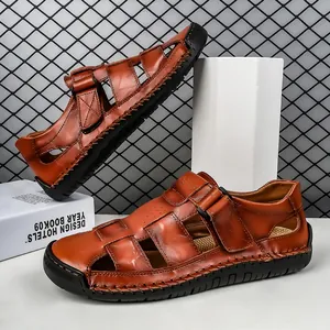Men's brown leather beach sandals with closed toe design and non-slip rubber soles