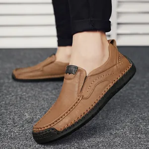 Brown leather loafers for men featuring handcrafted stitching and rubber soles