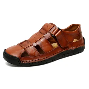 Men's brown leather beach sandals with breathable cutout design and sport stitching