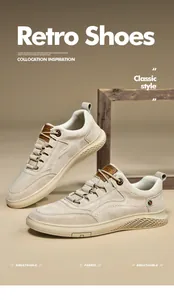 Detail of beige retro sneakers featuring breathable suede texture and honeycomb cushioned sole