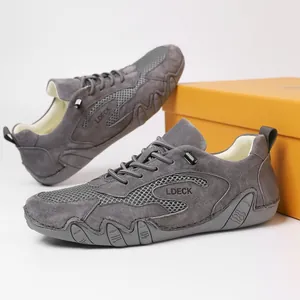 Breathable grey mesh outdoor sports shoes with suede details and non-slip rubber sole