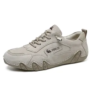 Men's outdoor leather casual sneakers in beige featuring durable rubber outsoles