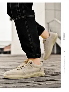 Detail of breathable beige suede sneakers showing mesh texture and running performance text