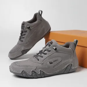 Gray high-top genuine leather boots with suede finish and hand-stitched detailing