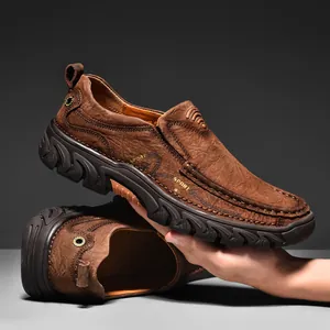 Men's brown textured leather slip-on shoes with thick durable rubber soles for outdoors