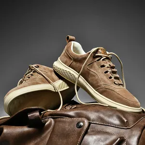Brown suede men's casual sneakers with thick honeycomb textured rubber soles