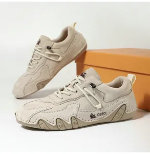 Detail view of premium leather outdoor casual shoes with hand-stitched suede finish