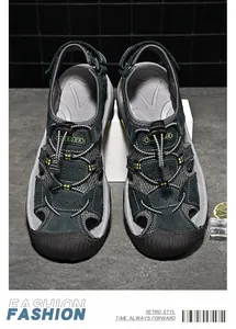 Close-up of breathable men's outdoor beach sandals with rubber toe protection and laces