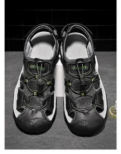 Detail of closed-toe outdoor sports sandals with quick-lace system and rubber sole