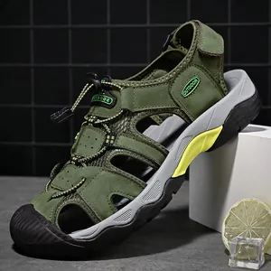 Detail of army green closed-toe outdoor sandal with elastic bungee laces and mesh