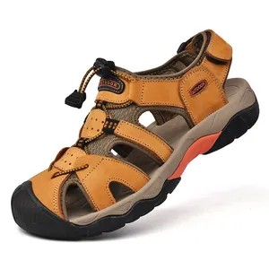 Detail of khaki outdoor sandals with protective rubber toe cap and quick lace system