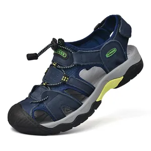 Detail of outdoor men's leather sandals showing closed toe and quick-lace bungee system