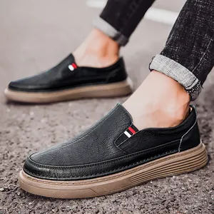 Men's black leather loafers with textured upper and thick anti-slip rubber soles