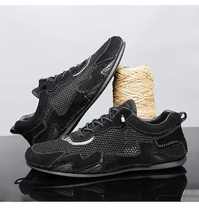 Close-up of black breathable mesh and suede texture on lightweight men's casual shoes