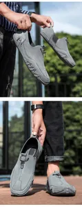 Close-up of grey suede leather loafers showing anti-slip rubber soles and slip-on design