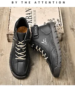 Close-up of black leather casual shoe with robust white hand-stitching and Salkin logo detail
