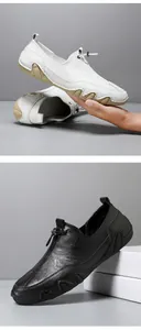 Detailed view of genuine leather loafers with pebble grain and wave-shaped rubber soles