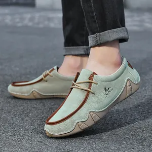 Men's low-top mint green suede loafers with brown leather accents and anti-slip rubber soles