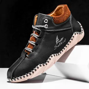 Men's high-top casual leather boots in black pebble grain with thick rubber soles