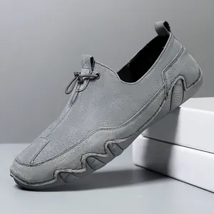Men's grey leather loafers with breathable perforated suede and anti-slip wave rubber soles
