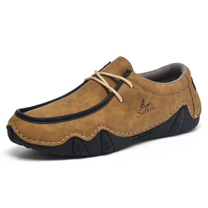 Detail of Salkin casual shoes showing brown leather texture and black wavy rubber sole