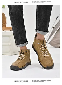 Detailed view of hand-stitched brown men's casual loafers showing premium leather texture