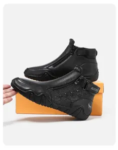 Detailed shot of leather boots featuring side zipper, velcro strap and non-slip rubber sole