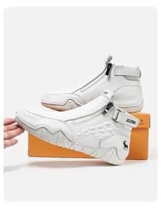Detailed macro view of white leather boot with buckle strap and goat logo branding