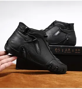 Detailed view of high-top leather casual shoe with non-slip rubber sole and side branding