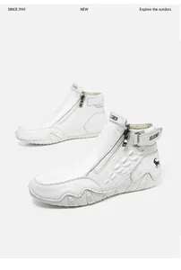 Detail of white high-top leather boots with crocodile texture and side zipper design