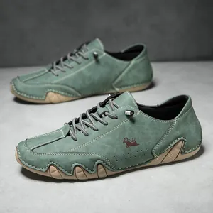 Macro detail of dark green suede casual shoes with durable rubber sole and lace-up closure