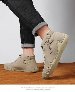 Detail of beige suede high-top men shoes with lightweight EVA foam sole for comfort