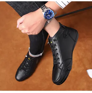 Detail view of premium black leather octopus style shoes with non-slip granular sole texture
