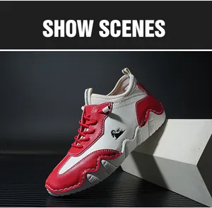 Detail view of red and white contrasting leather sneakers with a unique goat head logo side