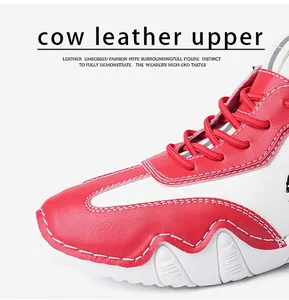 Close-up of premium embossed cow leather upper with stylish red and white contrast