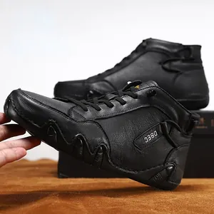 Premium black leather high-top sneakers for men featuring a unique wave-patterned non-slip sole