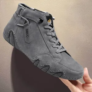 Premium grey suede high-top sneakers with lace-up design and unique wave textured soles