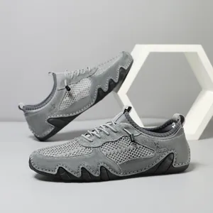 Men's breathable mesh sneakers with grey suede panels and durable stitched rubber soles