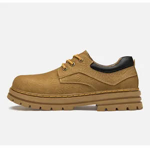 Detailed side view of camel leather low-top martin boots with textured embossing