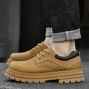 Men's mustard yellow leather low-top Martin boots with thick rubber soles and stitching