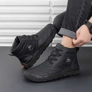 Detail of men's black leather boot showing the Sulkin logo and rubber toe cap label