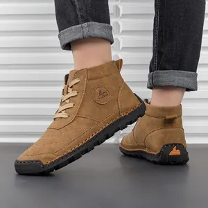 Men's leather work boots featuring anti-slip rubber soles and detailed stitching