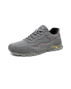 Close-up of leather trekking shoe with breathable mesh and thick anti-slip sole
