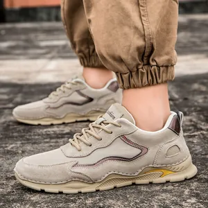 Men's outdoor leather hiking shoes in beige and khaki with thick rubber sole