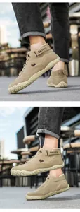 Macro view of khaki suede men's boot with LDECK logo, velcro strap, and textured rubber sole