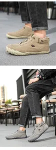 Close-up of khaki and grey suede high-top boots with non-slip rubber soles and velcro